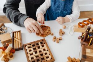 Father and Daughter Playing on the Table